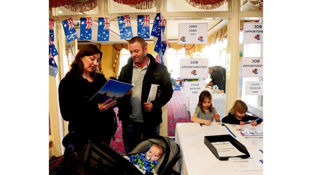 Carla and Derek Kinlan and family, of Bray, Co Wicklow, at the Australian visa seminar in Citywest Hotel yesterday. "We've been there before on a holiday working visa back in 1996 and on several holidays since. The kids love it and I think there will be better prospects for them in Australia," Mr Kinlan said.