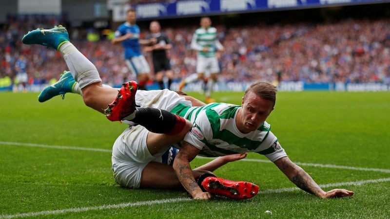 Leigh Griffiths in action with Rangers’ Ross McCrorie. Photograph: Russell Cheyne/Reuters