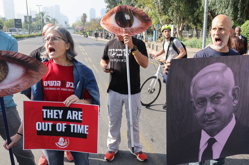 Relatives and supporters of Israeli hostages held in Gaza by Hamas militants during a demonstration in Tel Aviv on Thursday. Photograph: Jack Guez/AFP via Getty Images