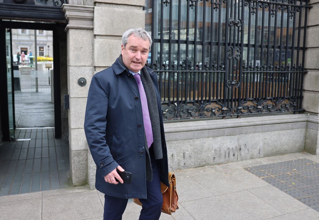 Robert Watt, Secretary General of the Department of Health, leaving the Oireachtas Finance Committee meeting at Leinster House: his abrasive response to questioning went down badly with some politicians. Photograph: Dara Mac Dónaill