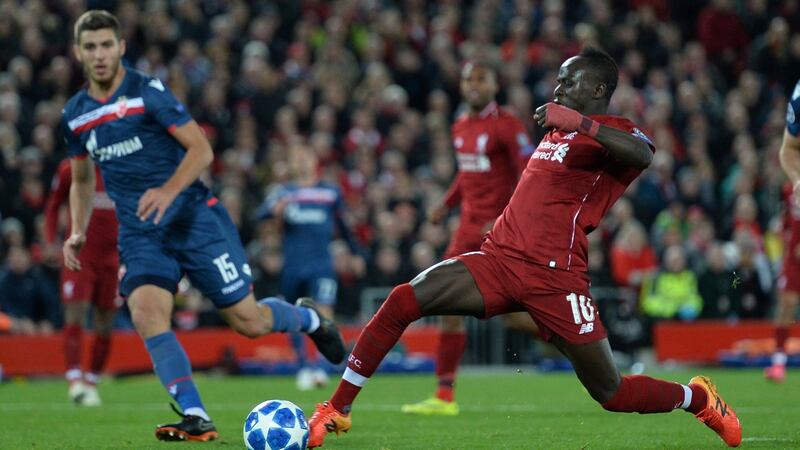 Liverpool’s Sadio Mane scores their fourth goal in the Champions League Group C match against Red Star Belgrade at Anfield. Photograph: Peter Powell/Reuters