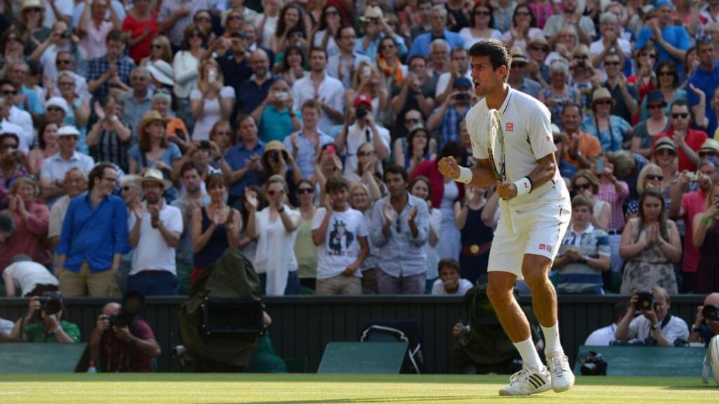 Novak Djokovic celebrates defeating Argentina’s Juan Martin Del Potro in their semi-final clash at Wimbledon. Photo: Dominic Lipinski/PA