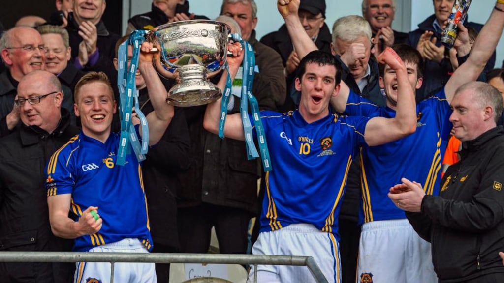 St Patrick’s, Cavan joint captains Cian McManus and Pierce Smith lift the MacRory Cup at the Athletic Grounds, Armagh. Photograph: Inpho