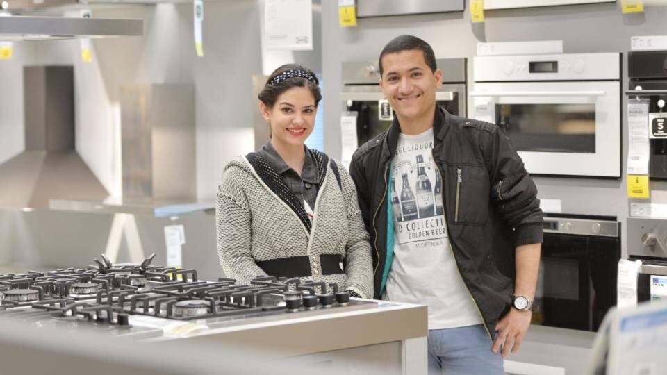 Silvia Brito and Renan Ferro: “I’m not buying, because I don’t have a house of my own,” says Brito. “I just love the shop and looking around. I like how fun it is – people need some joy in their lives.” Photograph: Alan Betson