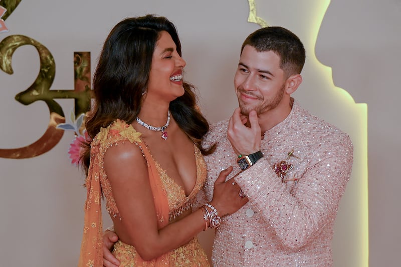 Ambani wedding: Bollywood actress Priyanka Chopra Jonas with husband Nick Jonas. Photograph: Punit Paranjpepunit Paranjpe/AFP via Getty