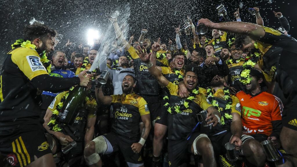 The Hurricanes celebrate after winning the 2016 Super Rugby Final match between the Hurricanes and the Lions at Westpac Stadium. Photo: Simon Watts/Getty Images