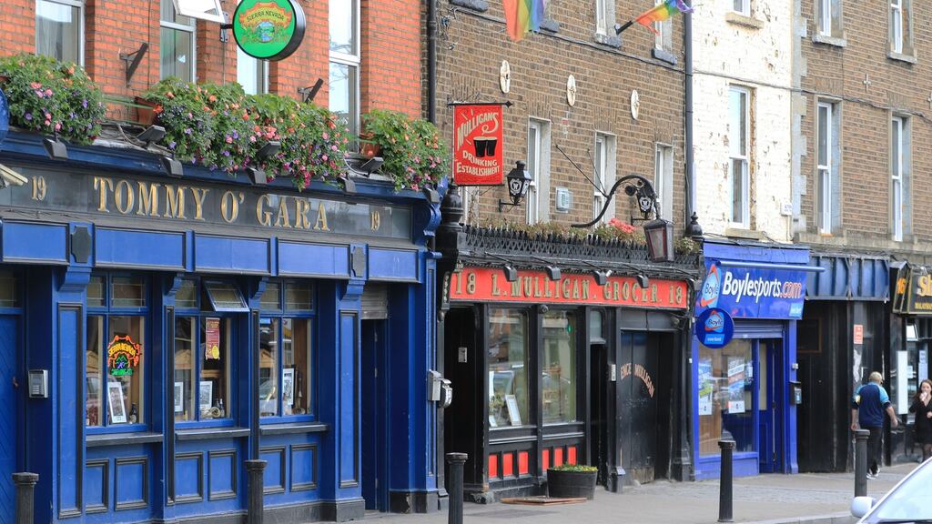 Stoneybatter, Dublin:  “I loved living there in the 1990s. Smoke from peat fires suffused the evening light as it slanted across the roofs of terraced houses.” Photograph: Nick Bradshaw