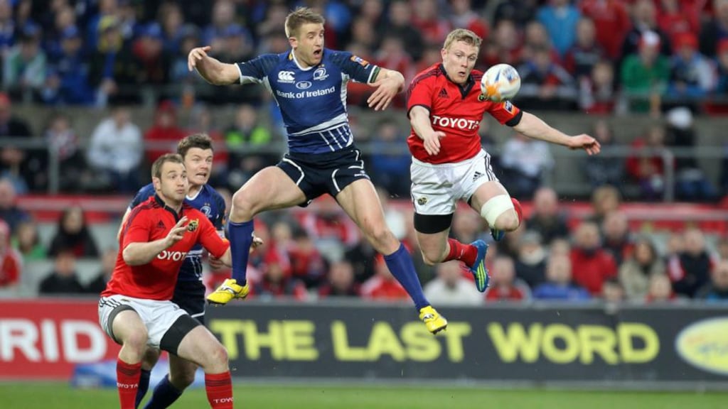Munster’s Keith Earls (right) will be out for up to four months. Photograph: Dan Sheridan