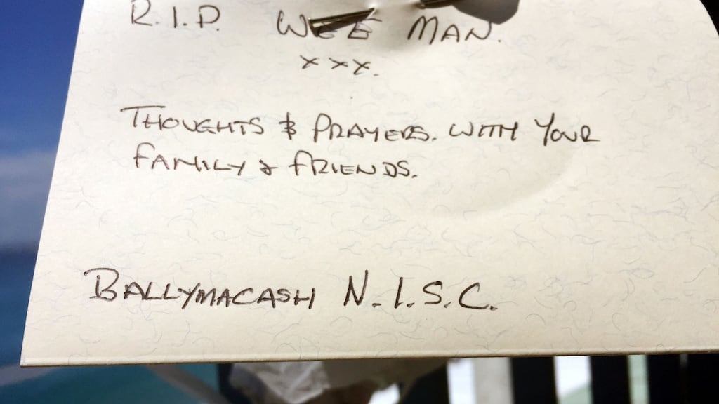 A message attached to flowers are left close to the scene where Darren Rodgers, from Ballymena, died after a fall in Nice in France. Photograph: Michael McHugh/PA Wire