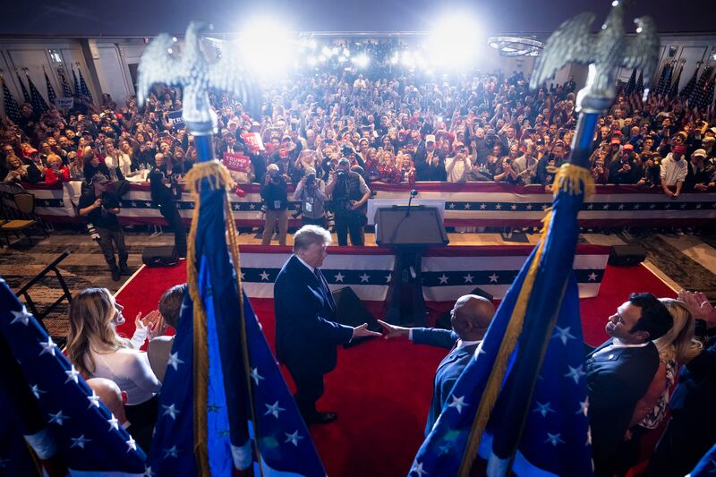 Former President Donald Trump shakes hands with Senator Tim Scott after defeating Nikki Haley in the New Hampshire primary election. Photograph: Doug Mills/New York Times
