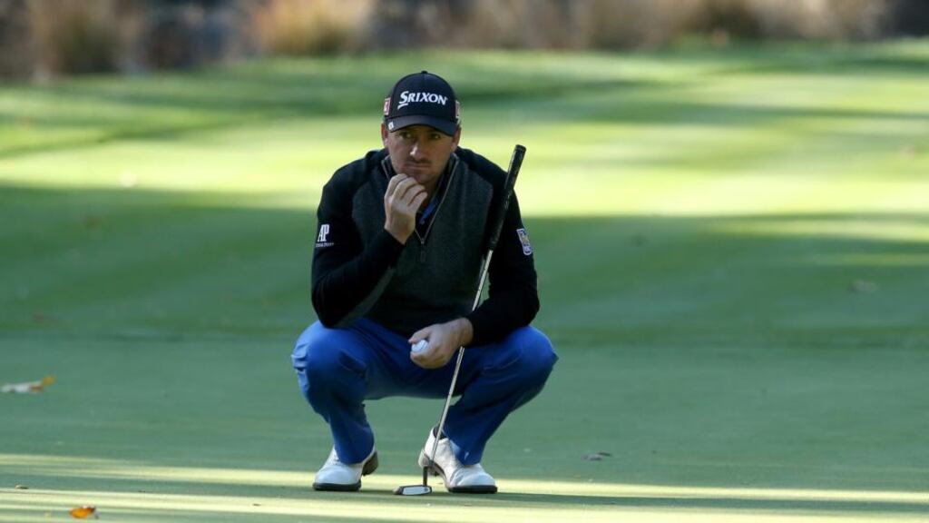 Graeme McDowell waits to putt on the 16th green during the third round of the Northwestern Mutual World Challenge at Sherwood Country Club. Photograph: Stephen Dunn/Getty Images)