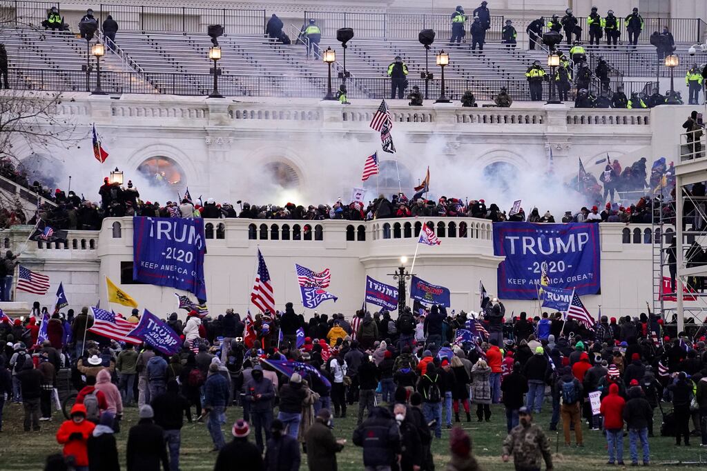Violent insurrectionists loyal to Donald Trump storming the Capitol on January 6th, 2021. Photograph: John Minchillo/AP