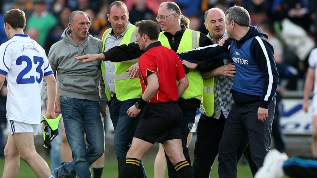 Cavan manager Peter Reilly confronts referee Derek O’Mahoney at the end of the All-Ireland Under 21 Football Championship semi-final at O’Moore Park in Portlaoise. Photograph: Donall Farmer/Inpho