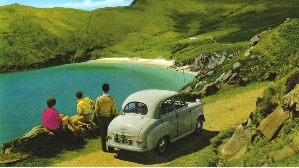 Achill Island on a John Hinde postcard. Not so long ago the implied assumption that an annual holiday must take place abroad would be  baffling to an Irish person.
