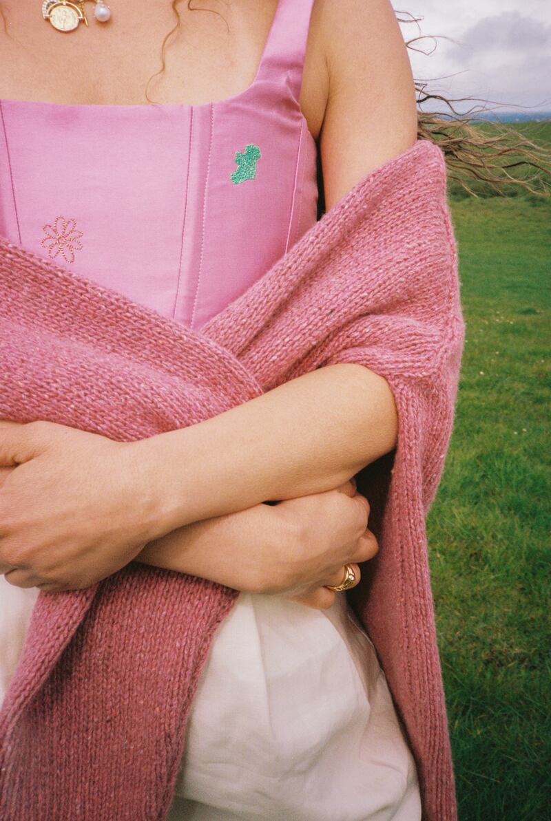 Rising Sun corset €260, pink sweater €150