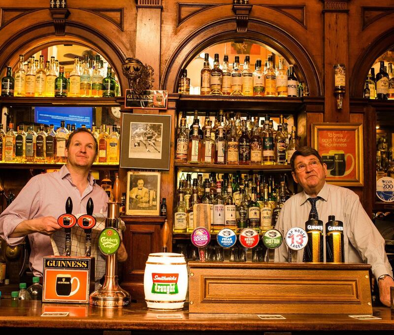 Pub crawl: father and son Willie and Liam Aherne at the Palace Bar in Dublin. Photograph: Elaine Hill