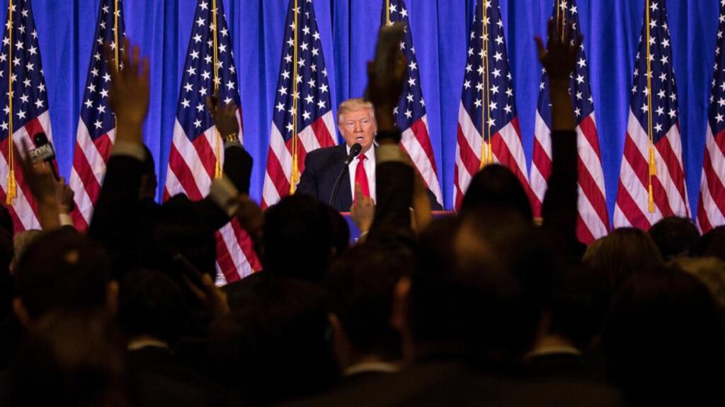 US president-elect Donald Trump takes questions from reporters at Trump Tower in New York on Wednesday. Photograph: Damon Winter/New York Times