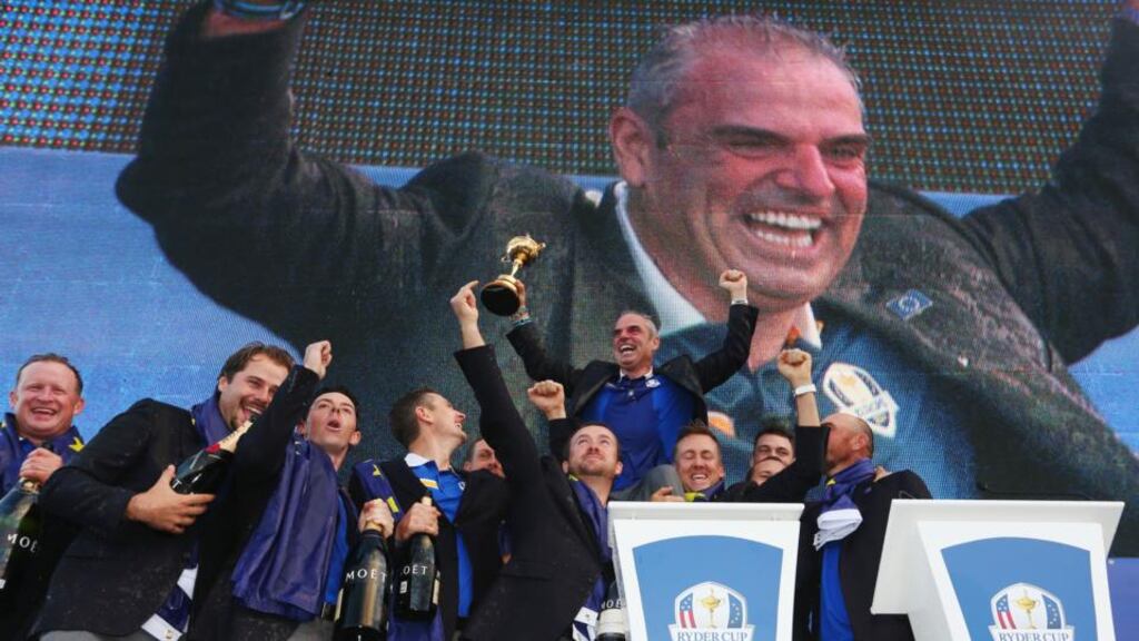 Europe team captain Paul McGinley celebrates winning the Ryder Cup with his team after the Singles Matches  on the PGA Centenary course at  Gleneagles. Photograph:  Ross Kinnaird/Getty Images