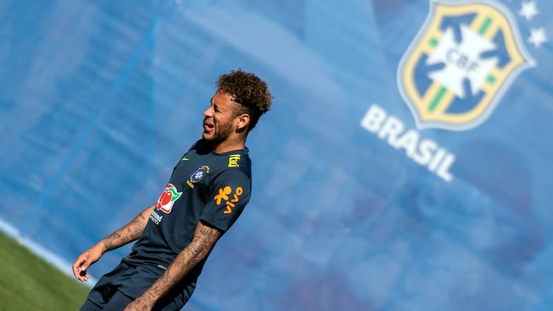Neymar trains on Wednesday ahead of Brazil’s World Cup opener against Switzerland. Photograph: Jewel Samad/AFP/Getty