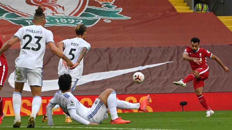 Mohamed Salah scores Liverpool’s third against Leeds. Photograph: Paul Ellis/EPA
