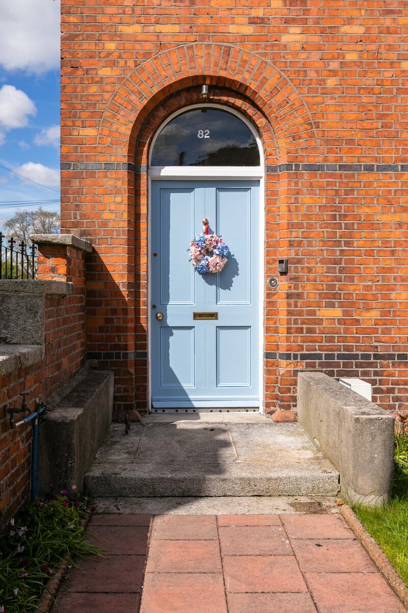 The baby-blue front door
