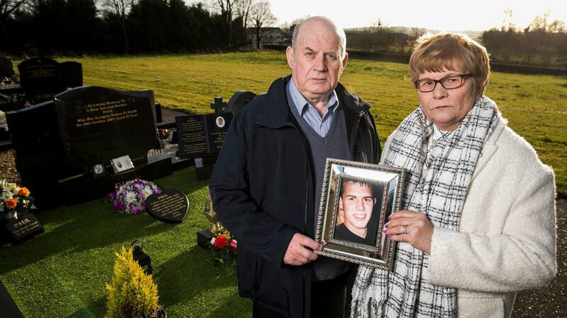 Stephen and Breege Quinn at the graveside of their murdered son Paul Quinn at St Patrick’s Church Cullyhanna Co Armagh. Photograph: Liam McBurney/PA Wire