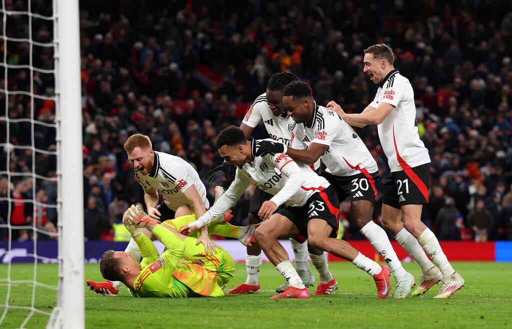 Bernd Leno of Fulham celebrates with team-mates after saving two penalties in their FA Cup fifth round match against Manchester United at Old Trafford on Sunday. Photgraph: Carl Recine/Getty Images