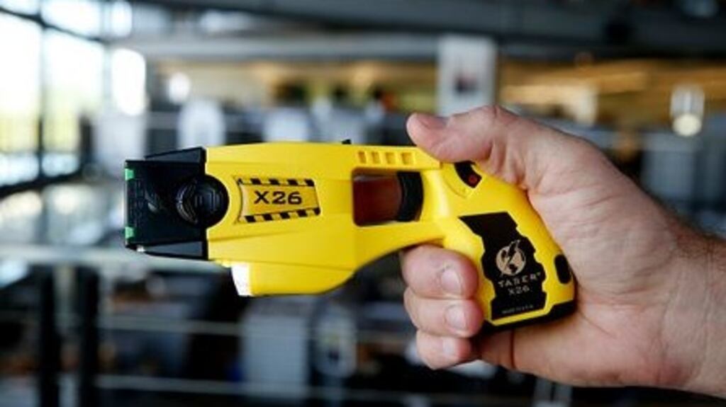 File image of a Taser device being tested. File photograph: Getty Images
