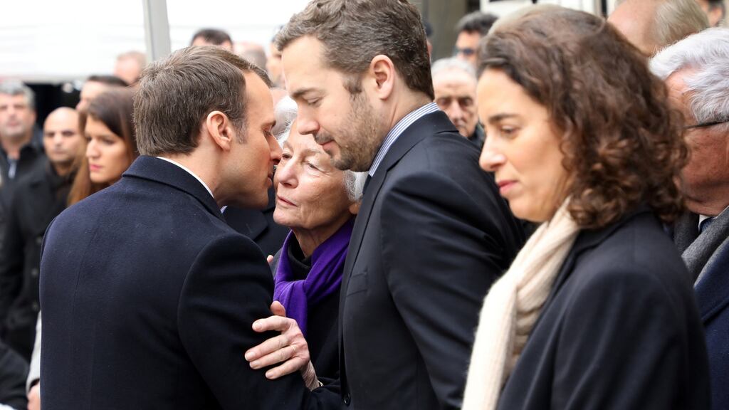 French president Emmanuel Macron greets Claude Érignac’s widow, Dominique, and  children Charles-Antoine and Marie-Christophine in Ajaccio, Corsica. Photograph: Ludovic Marin/Reuters