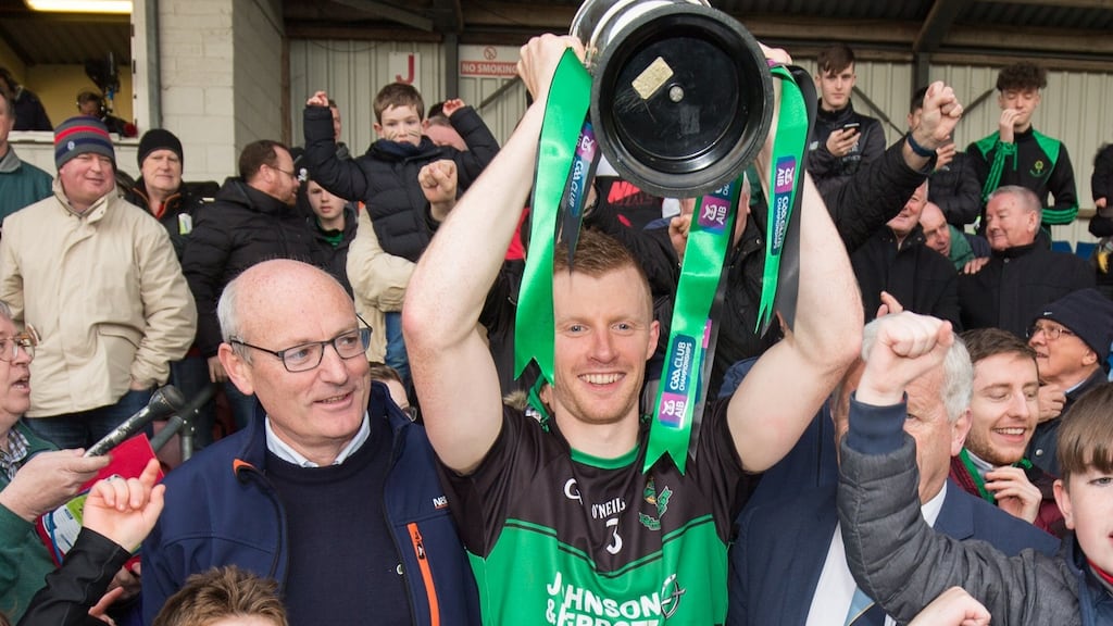 Aidan O’Reilly of Nemo Rangers lifts the trophy at Páirc Uí Rinn after his team defeated All-Ireland club champions Dr Crokes to win the Munster SFC final. Photograph: Oisin Keniry/Inpho