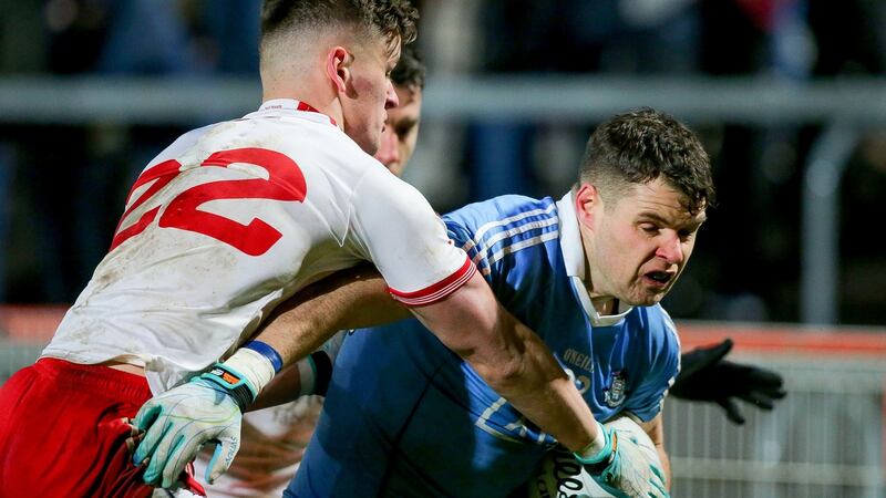 Tyrone’s Michael McKernan challenges Dublin’s Kevin McManamon. Photograph: Philip Magowan/Inpho
