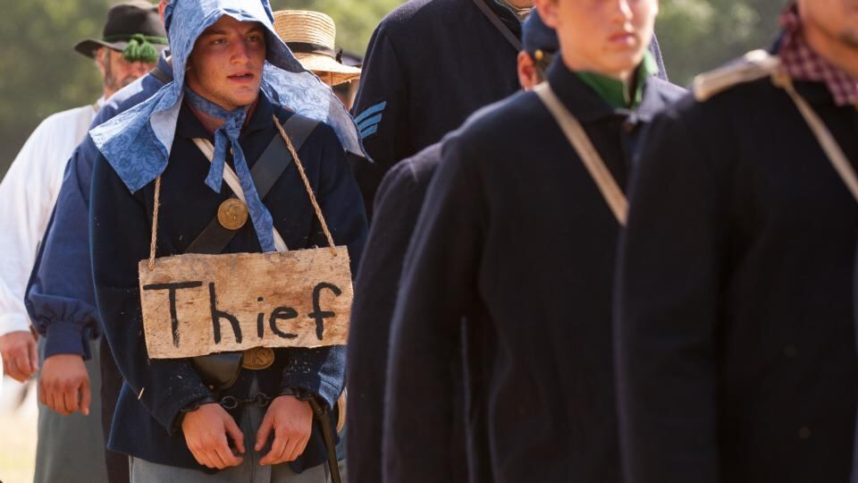 Union troops make an example of one of their own who was caught stealing at the 150th Gettysburg celebration and re-enactments. Photograph: Karen Bleier