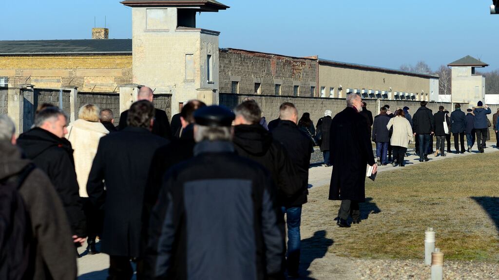 Visitors at the Sachsenhausen memorial of a former Nazi concentration camp in Oranienburg near Berlin, on International Holocaust Remembrance Day. Photograph: Maurizio Gambarini/AFP