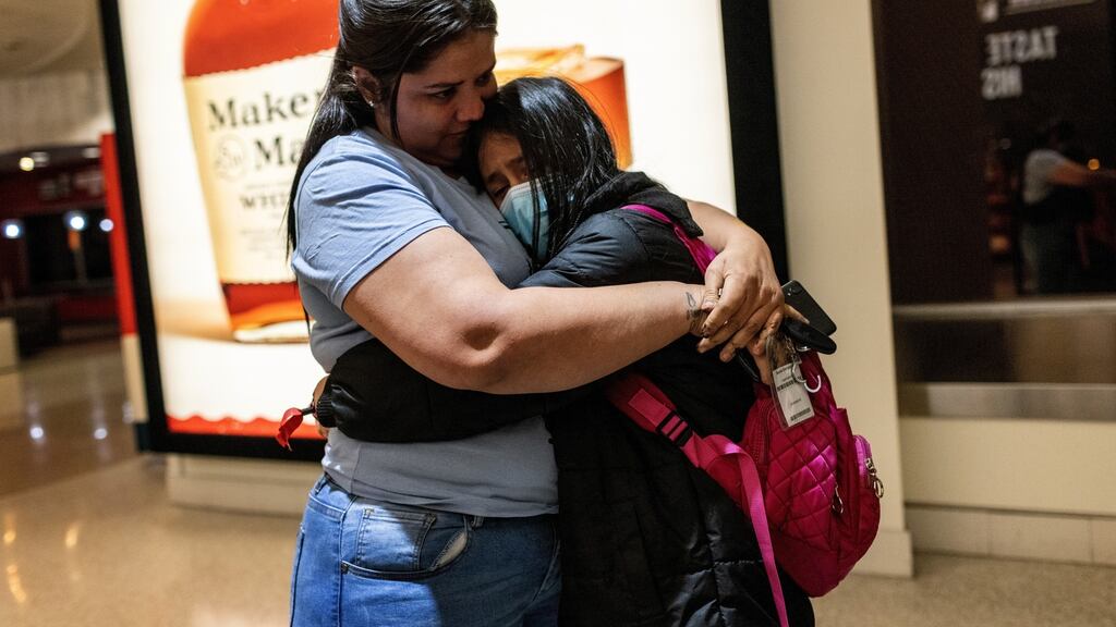 Honduran immigrant Nani (10) is greeted by her aunt Saiyda Gonzalez upon her arrival to Louisville, Kentucky. The unaccompanied minor had been released that day from US Health and Human Services custody after spending nearly eight weeks in shelters. Photograph: John Moore/Getty Images