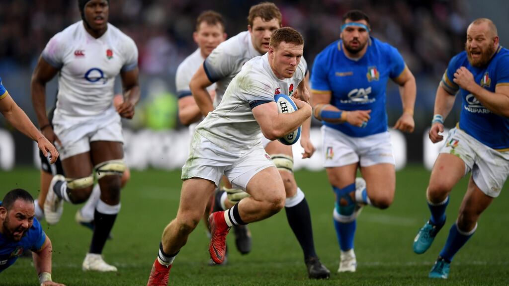 Sam Simmonds breaks to score the first of his brace of tries against Italy. Photograph: Shaun Botterill/Getty