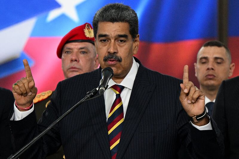 President Nicolás Maduro (C) addresses the media after appearing before the supreme court on August 9th, 2024, to affirm his disputed re-election. Photograph: FEDERICO PARRA/AFP via Getty Images