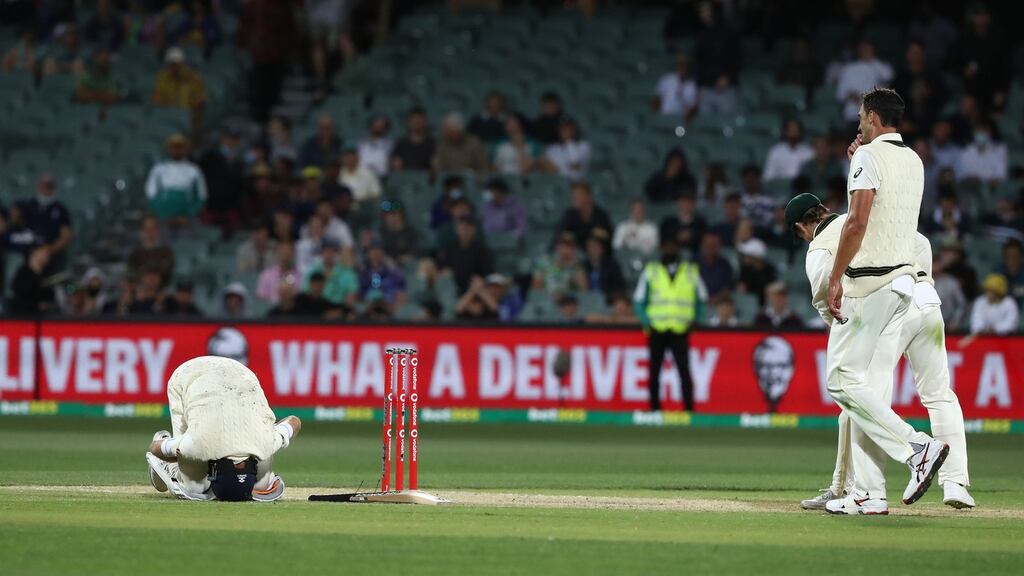 England’s Joe Root after being struck during day four of the second Ashes test against Australia at the Adelaide Oval. Photo: Jason O’Brien/PA Wire
