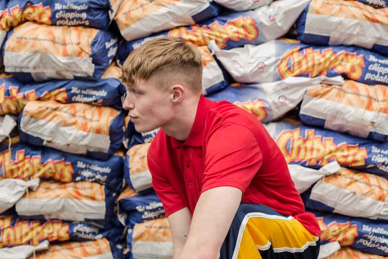 Red polo shirt €5, Gorta, Capel Street, Dublin 1; navy tracksuit bottoms €6, Age Action, Camden Street, Dublin 8