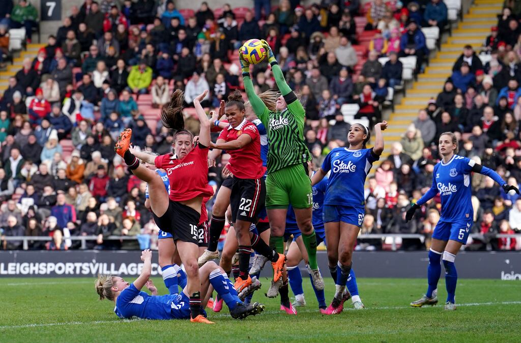Everton goalkeeper Courtney Brosnan collects a high ball during the Barclays Women's Super League match at Leigh Sports Village, Leigh. Photograph: Martin Rickett/PA