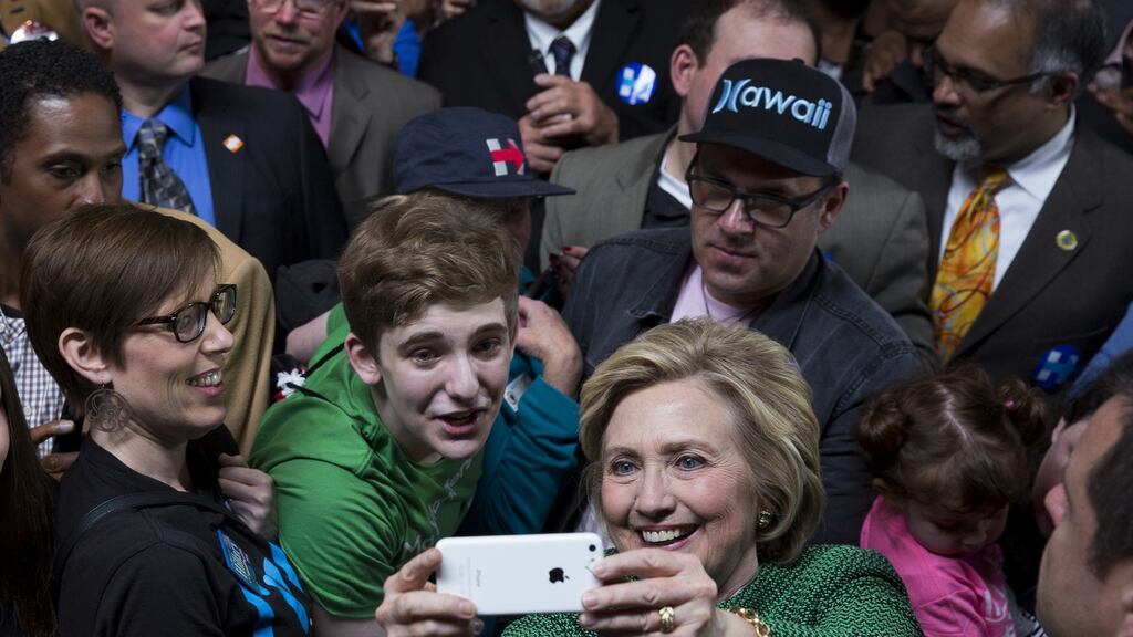 Hillary Clinton takes a selfie at a rally in Baltimore, Maryland, on Sunday. Photograph: Drew Angerer/Bloomberg