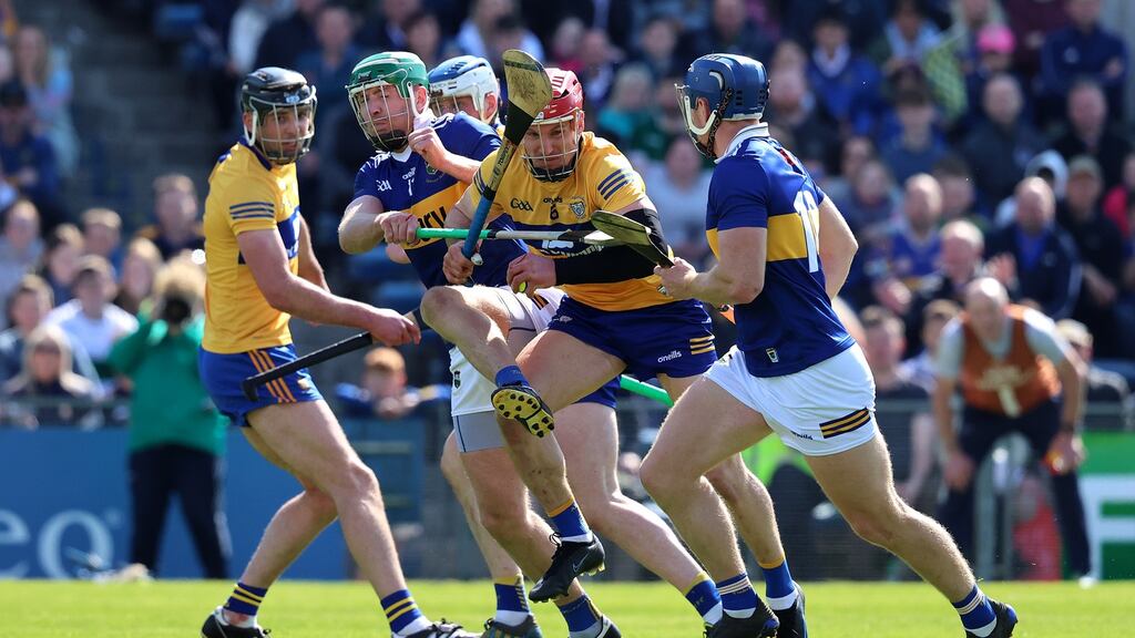 Tipperary’s Noel McGrath tackles John Conlon of Clare. Photograph: Bryan Keane/Inpho