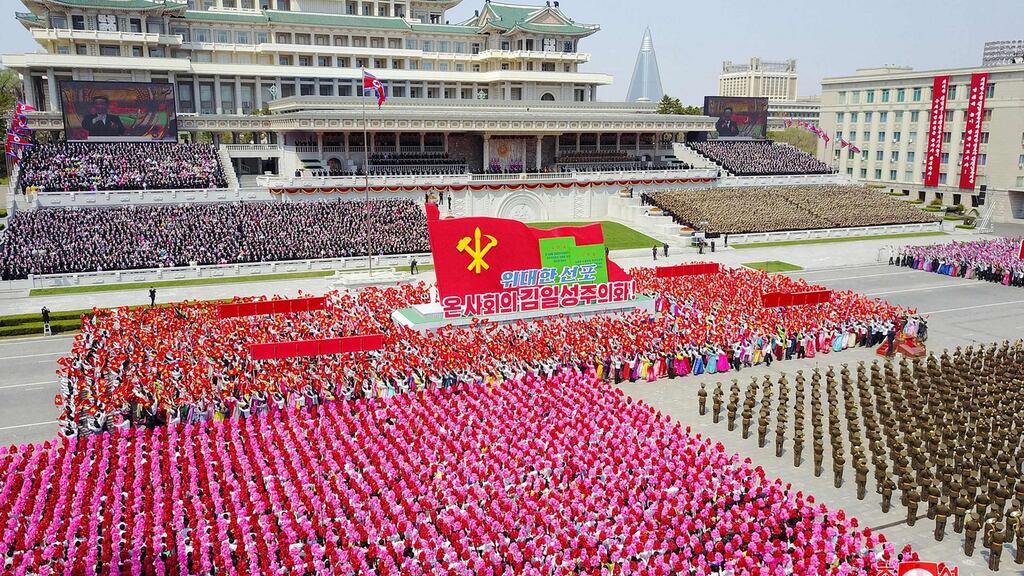 Thousands of people marched in Pyongyang in a choreographed display of loyalty to the Kim family. Photograph: STR/KCNA VIA KNS/AFP via Getty Images