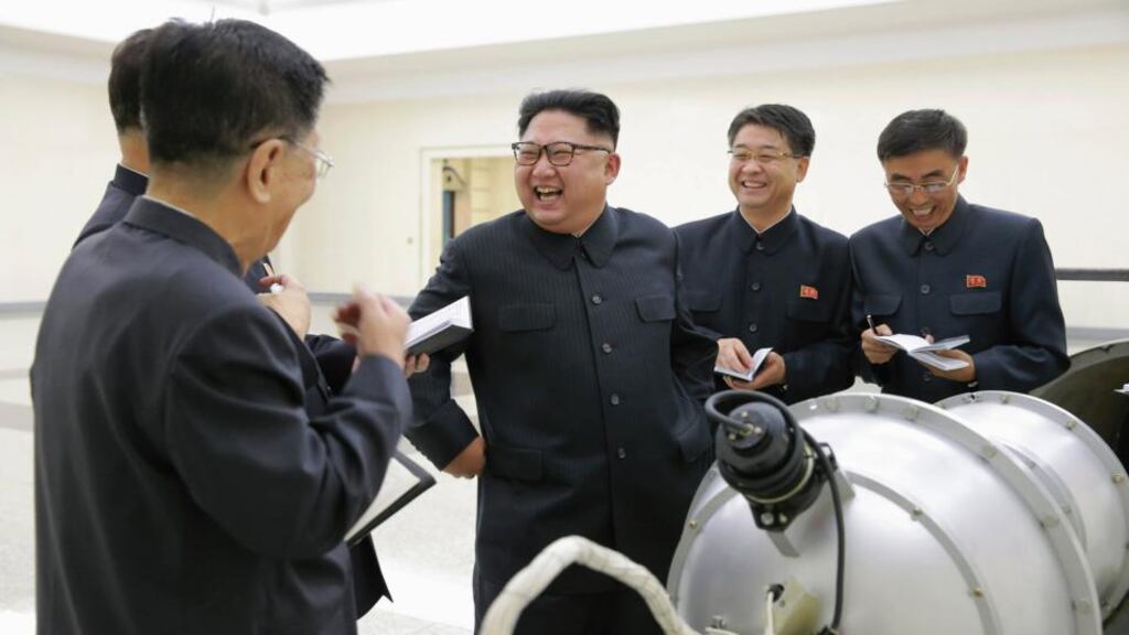 Kim Jong-un (centre) purportedly guiding the work for nuclear weaponisation at an undisclosed location in North Korea. Photograph: EPA