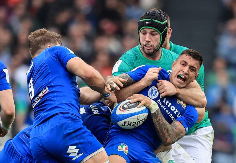 Ireland’s Caelan Doris in action against Pierre Bruno of Italy. Photograph:Dan Sheridan/Inpho