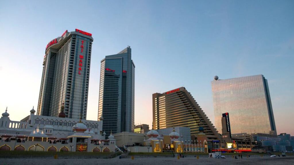 The Trump Taj Mahal, left, the Showboat Atlantic City Hotel and Casino, centre, and Revel Atlantic City stand in Atlantic City, New Jersey. Once the east coast’s gambling hub, Atlantic City has suffered as casinos opened in neighboring states including Pennsylvania and New York after they legalised gambling or expanded betting to increase tax revenue. Photograph: Ron Antonelli/Bloomberg