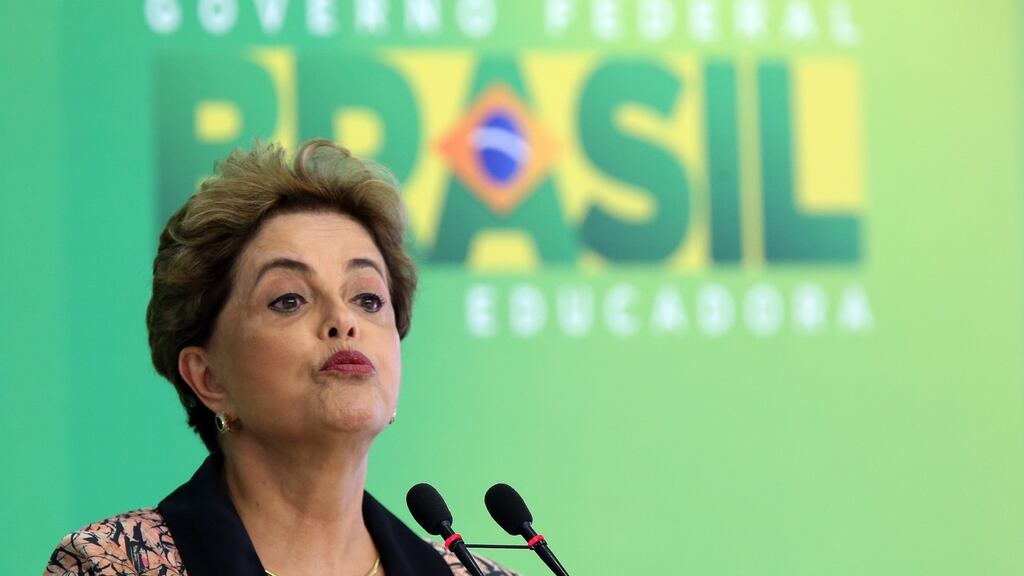 Brazil’s president Dilma Rousseff speaks to members of the foreign press at the presidential palace in Brasilia, on Tuesday. Photograph: Lula Marques/Bloomberg