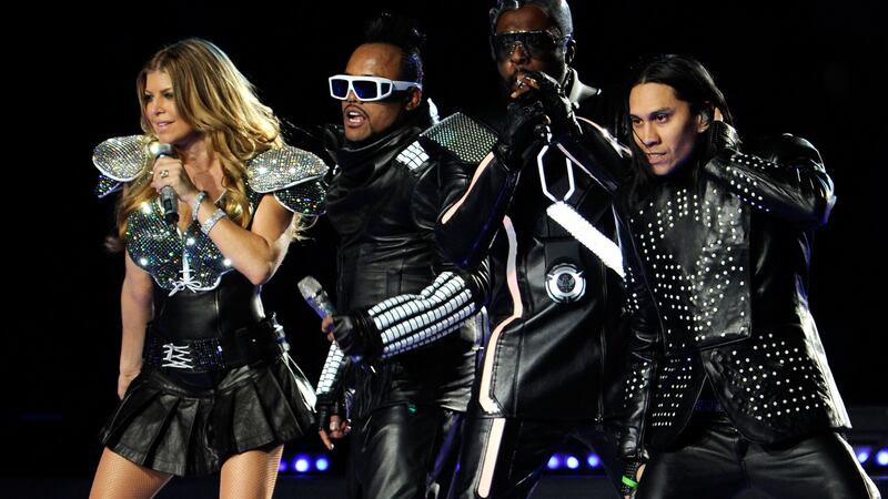 ARLINGTON, TX - FEBRUARY 06: Fergie, apl.de.ap, will.i.am and Taboo of The Black Eyed Peas perform during the Bridgestone Super Bowl XLV Halftime Show at Dallas Cowboys Stadium on February 6, 2011 in Arlington, Texas. (Photo by Kevin Mazur/WireImage)