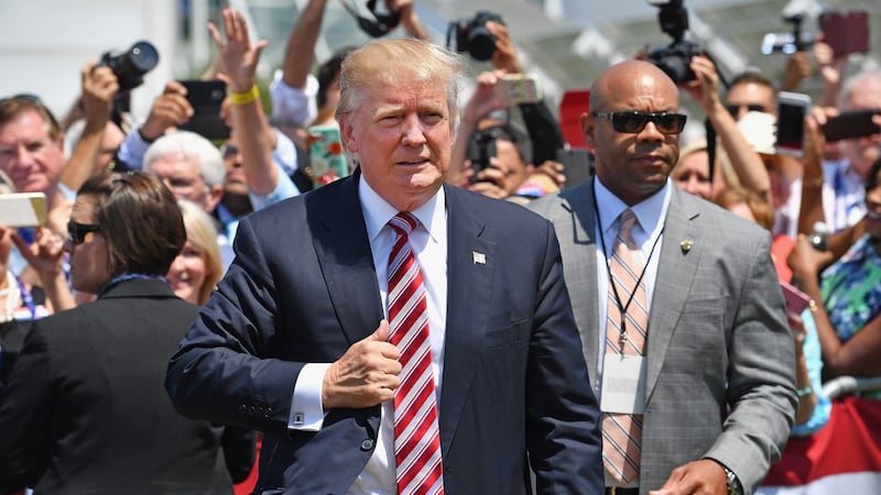 Republican presidential candidate Donald Trump and his family attend a welcome arrival event with governor Mike Pence and his family at the Great Lakes Science Centre in Cleveland, Ohio, on Wednesday. Photograph: Jeff J Mitchell/Getty Images
