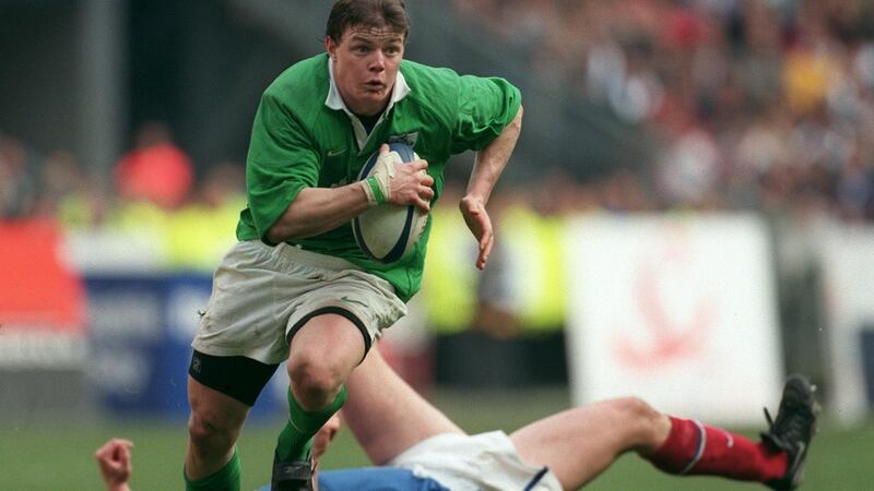 Brian O’Driscoll breaks through to score one of his tries during the match against France in 2000. Photo: Billy Stickland/Inpho