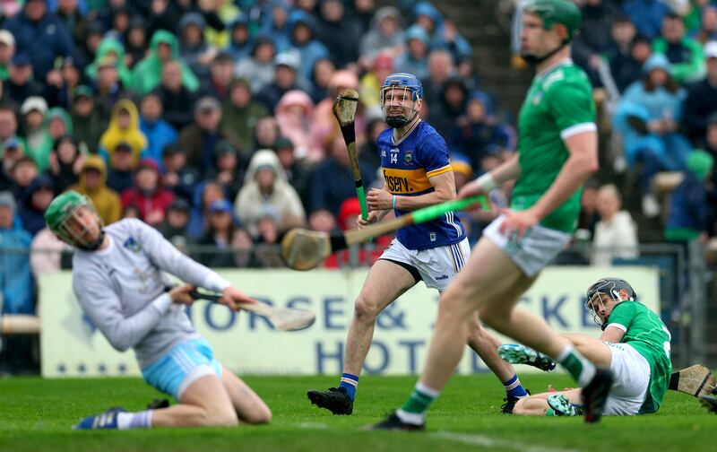 Tipperary’s John McGrath scores against Limerick during this year's Munster Championship. Photograph: James Crombie/Inpho